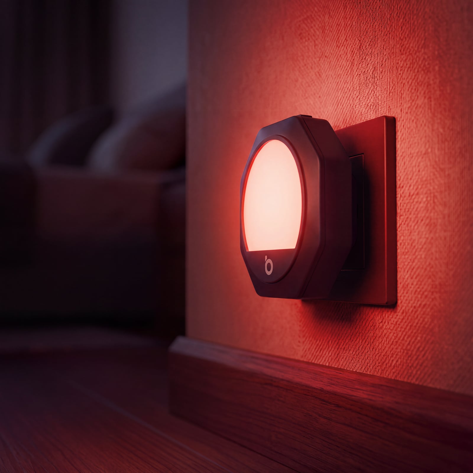 Luz nocturna roja en la pared de un dormitorio